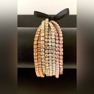 J. Crew set of eight stretchy gemstone bracelets.